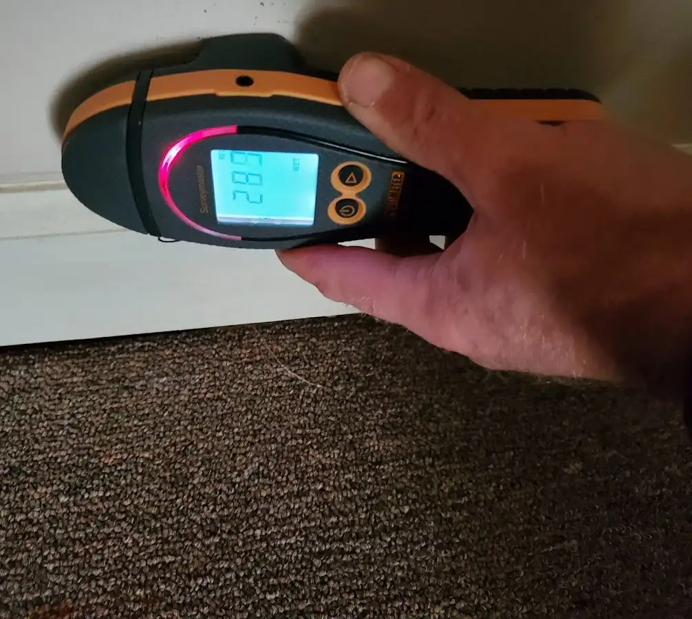 Moisture detection at baseboard during Mold Inspection & Testing in Ada